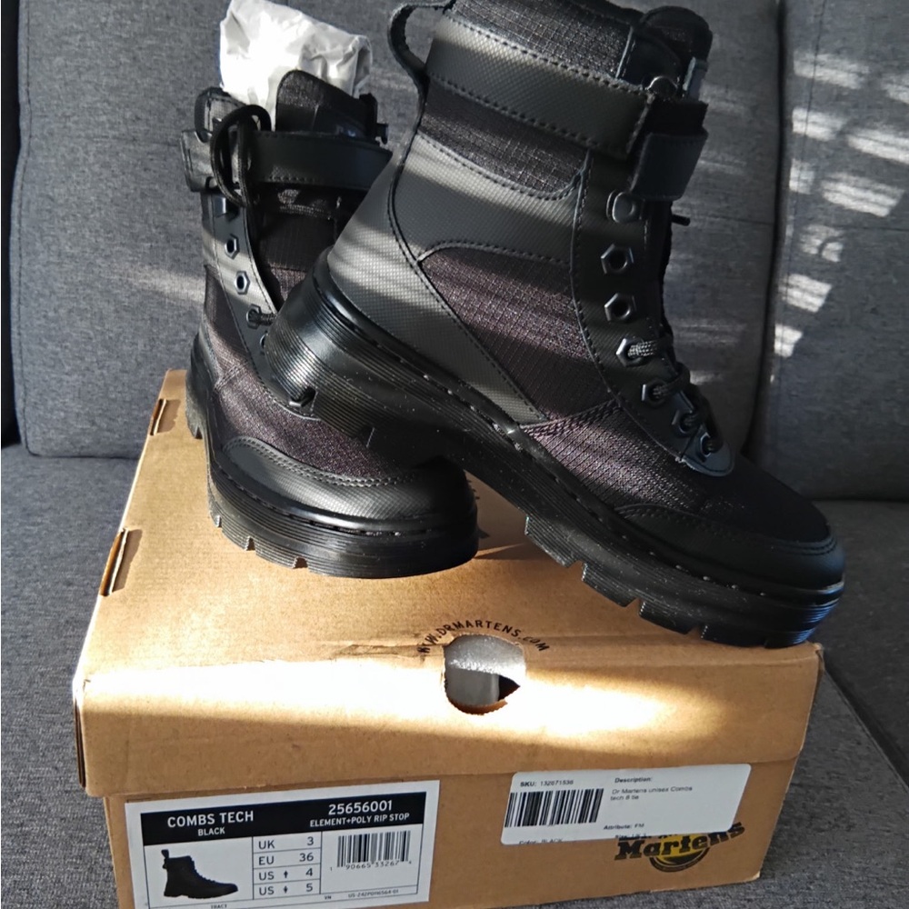 Dr. Martens Black Combat Boots with Lace-Up Design